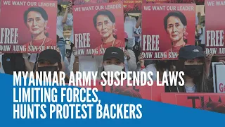 Myanmar army suspends laws limiting forces, hunts protest backers