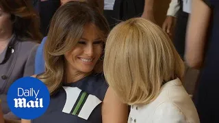 Melania Trump chats cheerfully with Brigitte Macron in Brussels