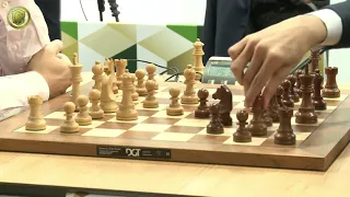 Carlsen's young opponent staring him like a tiger