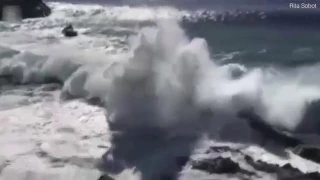 Terrifying moment huge wave knocks over man in sea tragedy