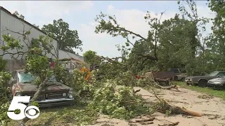 Northwest Arkansas residents assess the damage from Sunday morning's storms