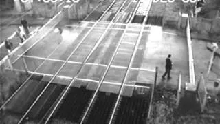 Idiot at Level Crossing jumps gate