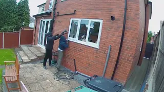 Burglars caught on CCTV breaking into a house in broad daylight