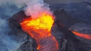 VOLCANO FLOODS VALLEY WITH RIVERS OF LAVA, AERIAL EPIC VIEW! REAL SOUND OF VOLCANO