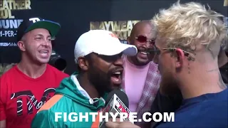 FLOYD MAYWEATHER BRAWL WITH JAKE PAUL ; FLOYD GOT TRIGGERED AND PUNCHED HIM STRAIGHT IN HIS FACE