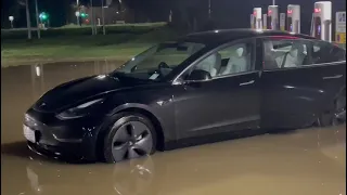 Tesla Driver Charges Car in Flood Waters Wokingham