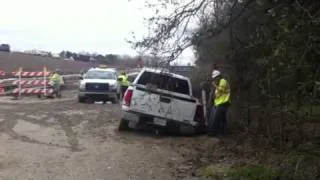 Truck stuck in mud epic fail !  Highway worker gets newly created job