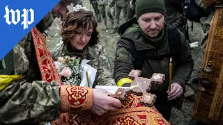 Fatigues and flowers: a wartime wedding in Ukraine