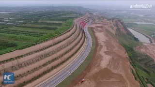 828 km-long highway along Yellow River opens to traffic in Shaanxi, China