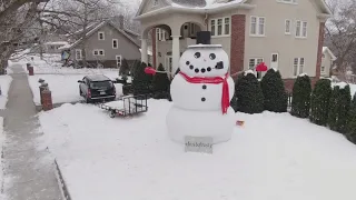 Giant snowman makes annual appearance in Minnesota community