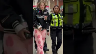 Fashion Police Escort Girl In Pyjamas Off Premises