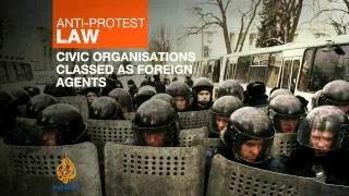 Ukraine's leader approves anti-protest laws