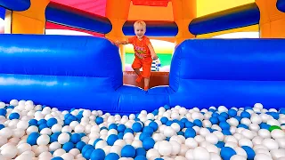 Vlad and Niki play in Inflatable Castle and other funny challenges for kids