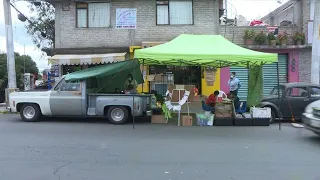 Children study in back of truck in virus-hit Mexico | AFP