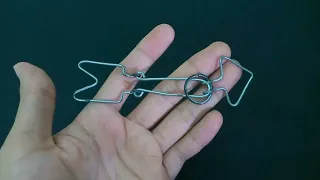 How to solve ring and arrow metal puzzle