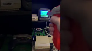 Tiny CRT TV bought at a flea market. Playing Duck Hunt (NES)