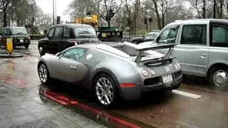 Bugatti Veyron pulling away and automatic spoiler