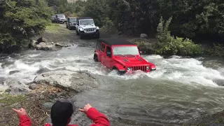 Jeep Wrangler JL 2018 crossing a river in New Zealand