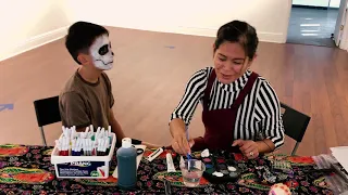 Learn how to apply Day of the Dead face paint