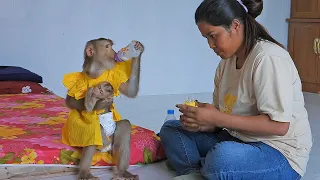 Mom Preparing Milk For Adorable Luna With Little Valen