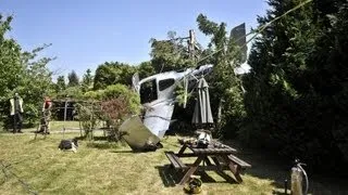 Plane parachutes into Cheltenham garden