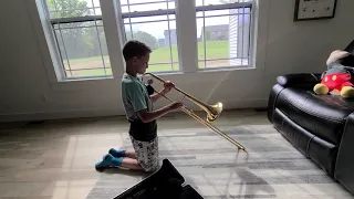 Trombone unboxing!  Logan starts 5th grade band