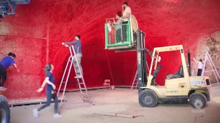 Timelapse video of installation "A Walk through the Line" by Chiharu Shiota