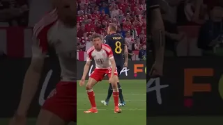 Toni Kroos and Thomas Muller's reaction to Kroos' pass and Vinicius' goal