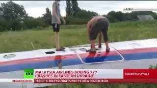 Malaysia MH17 crash site witness  bodies, debris, passports scattered   YouTube