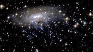 Zooming in on spiral galaxy ESO 137-001 #HubbleESA