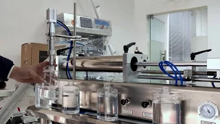 Semi automatic Horizontal piston liquid filling machine for juice, water, oil, wine, cosmetics
