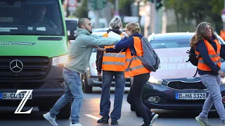 Aktivisten der Letzten Generation behindern Verkehr in Berlin mit Laufblockade