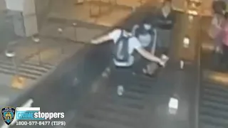 Search for man who kicked woman down subway escalator