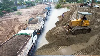 Incredible 5T Dump Trucks Waiting To Loading Sand Filling On Water With An Old Bulldozer