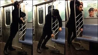 Watch This Man Vomit Epically on the Subway