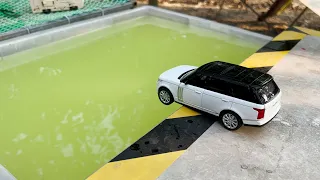 Various Diecast Model Cars Sliding Into The Water