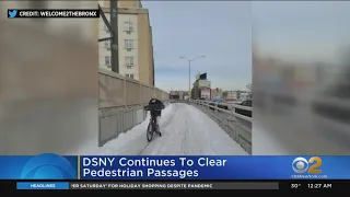 DSNY Continues To Clear Pedestrian Passages After Snow Storm