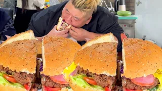Monkey's 10  giant beef burger  packed with fixings  feeds 3  one bite at a time! [Fat Monkey Boy]