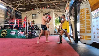 Muay Thai routine. Pad work in Thailand