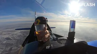 Stunt Pilot Pours And Drinks Red Bull Upside Down