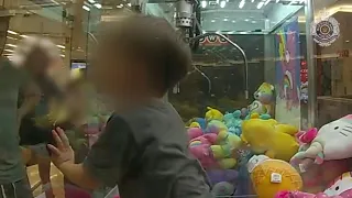 Australian toddler rescued from stuffed toy arcade claw machine | AFP