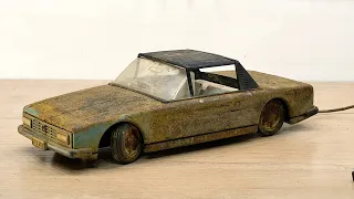 Restoration of a very rusty and old toy car