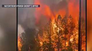 Rare wildfires force mass evacuations
