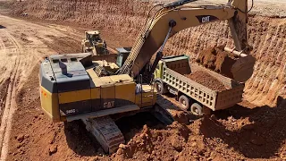 Caterpillar 365C Excavator Loading Trucks