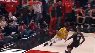 Josh Hart balances on one foot while sliding to avoid going out of bounds with basketball 11/3/18