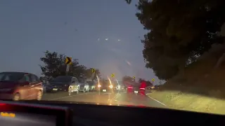 westbound from cahuenga cars lining the street people on sides 8:34p