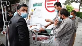 Dozens killed in bomb attack near school in Kabul