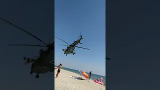 Russia Attack Helicopter low flying crossing the Beach of Crimea