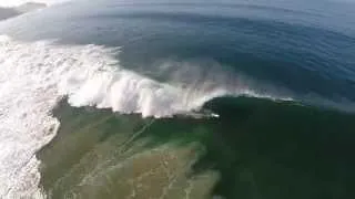 Epic double barrel by Reef Mcintosh at zuma beach in Malibu, California  Aerial drone surfing