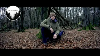 Solo Bushcraft, Camp using: Canvas Lavvu with lake views in the pouring rain.